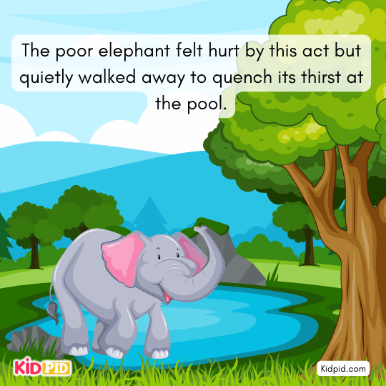 Hurt elephant walking away sadly to drink water from the town pool.