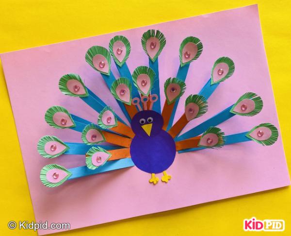 Colorful 3D paper peacock with feathers