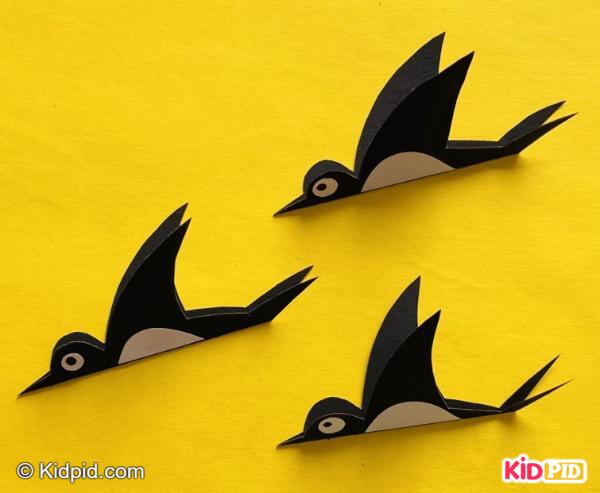 Black flying bird silhouette cutouts