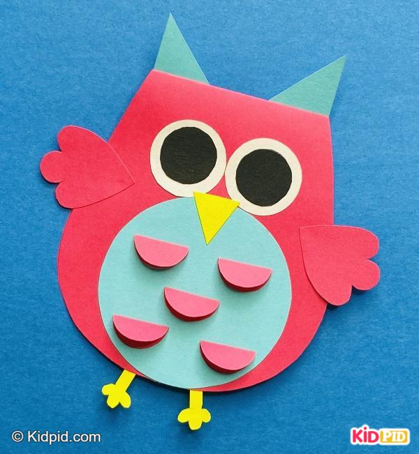 Cute colorful paper owl with layered feathers