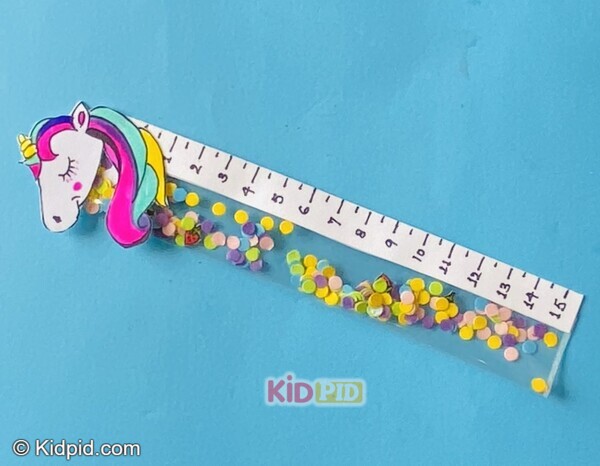 unicorn ruler craft with colorful confetti