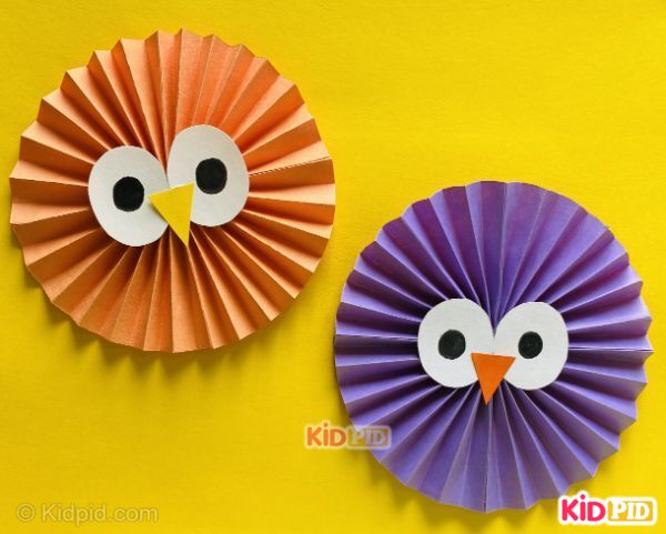 folded paper owl face craft in circles