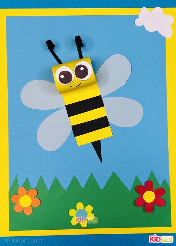 cute paper bee flying over flowers