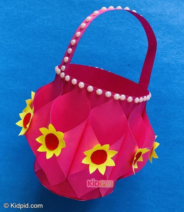 pink paper basket craft with flowers