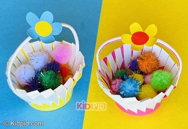 small paper baskets filled with pom poms