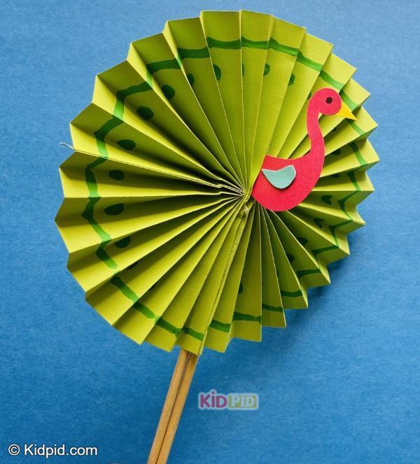 paper peacock fan craft with folded rosette