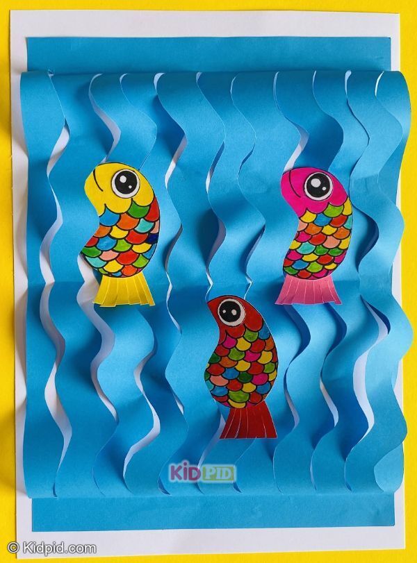 colorful fish craft with wavy blue paper